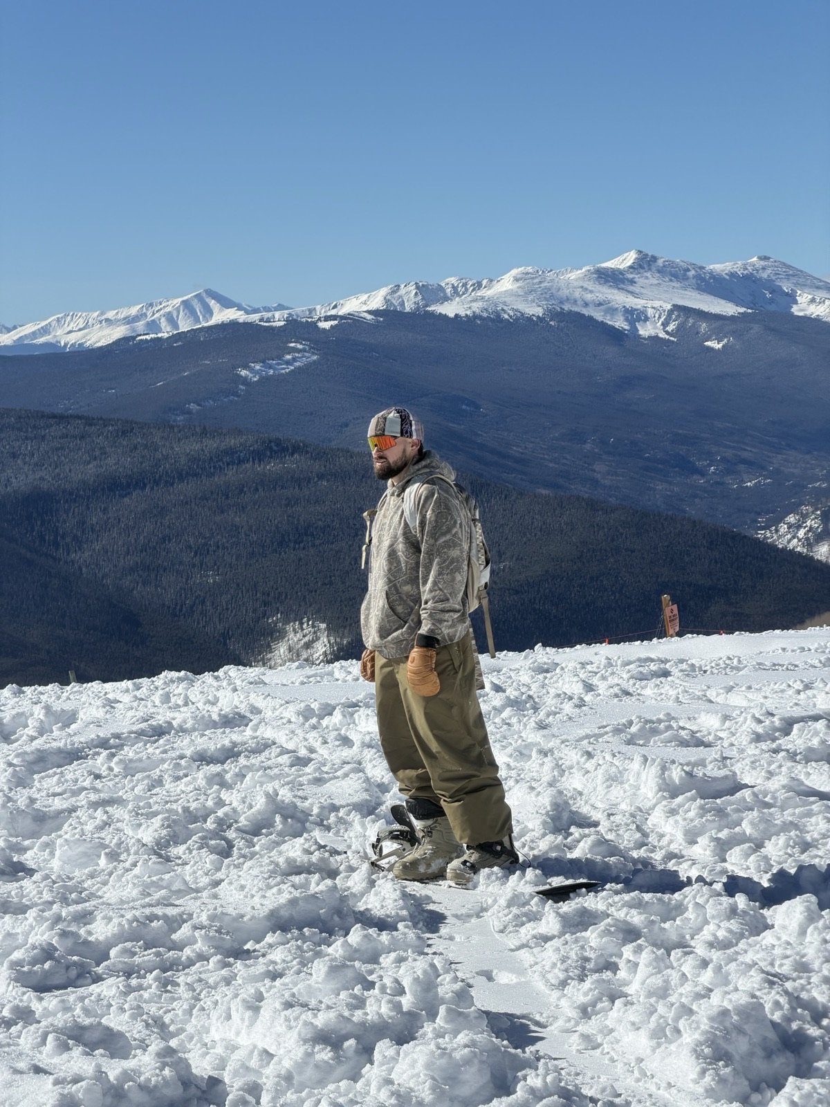 Briley on a Colorado peak in Ascension Athletics gear